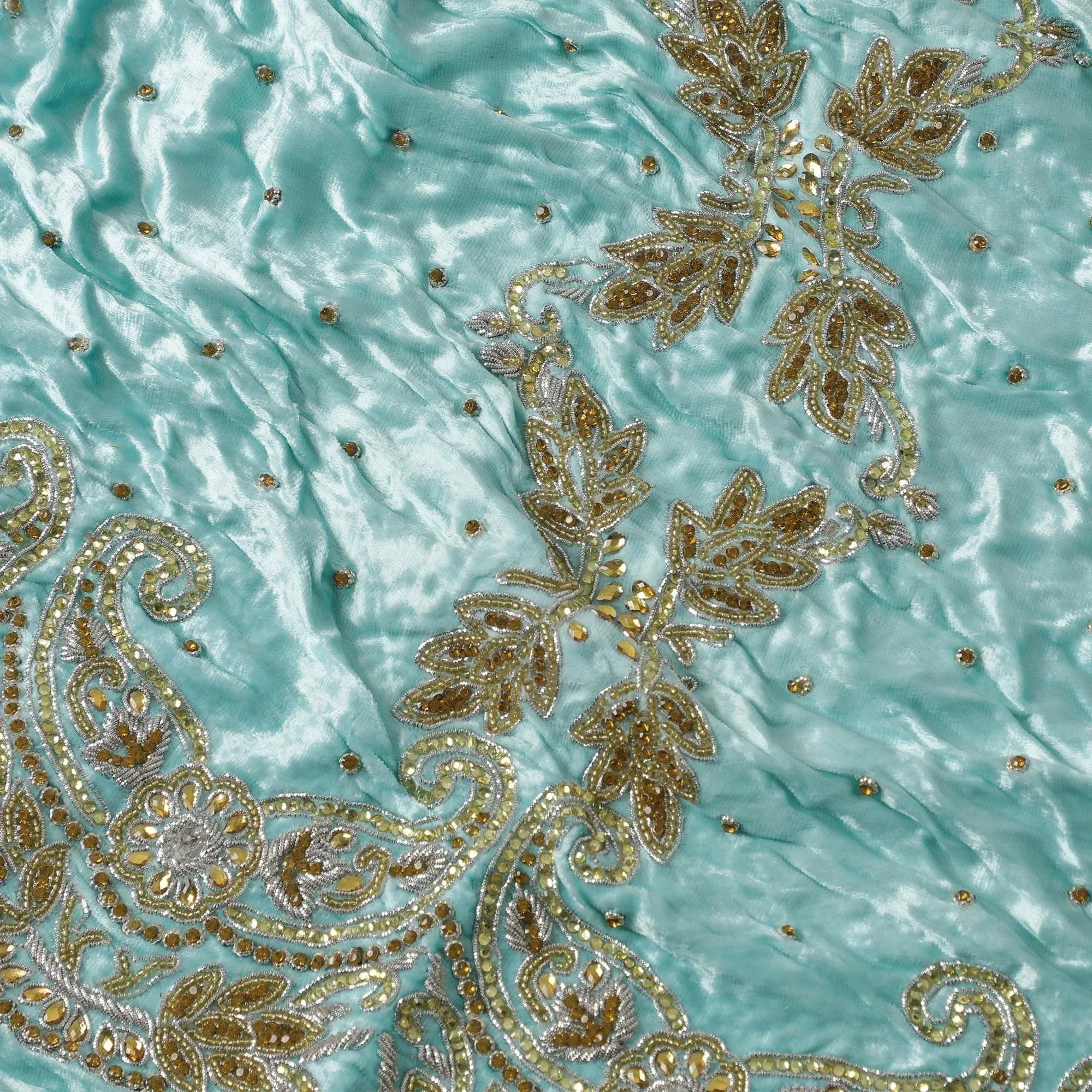 Arctic blue Rayon velvet fabric with metallic silver zardozi work, green , white and  orange stone work, green beads in fancy design