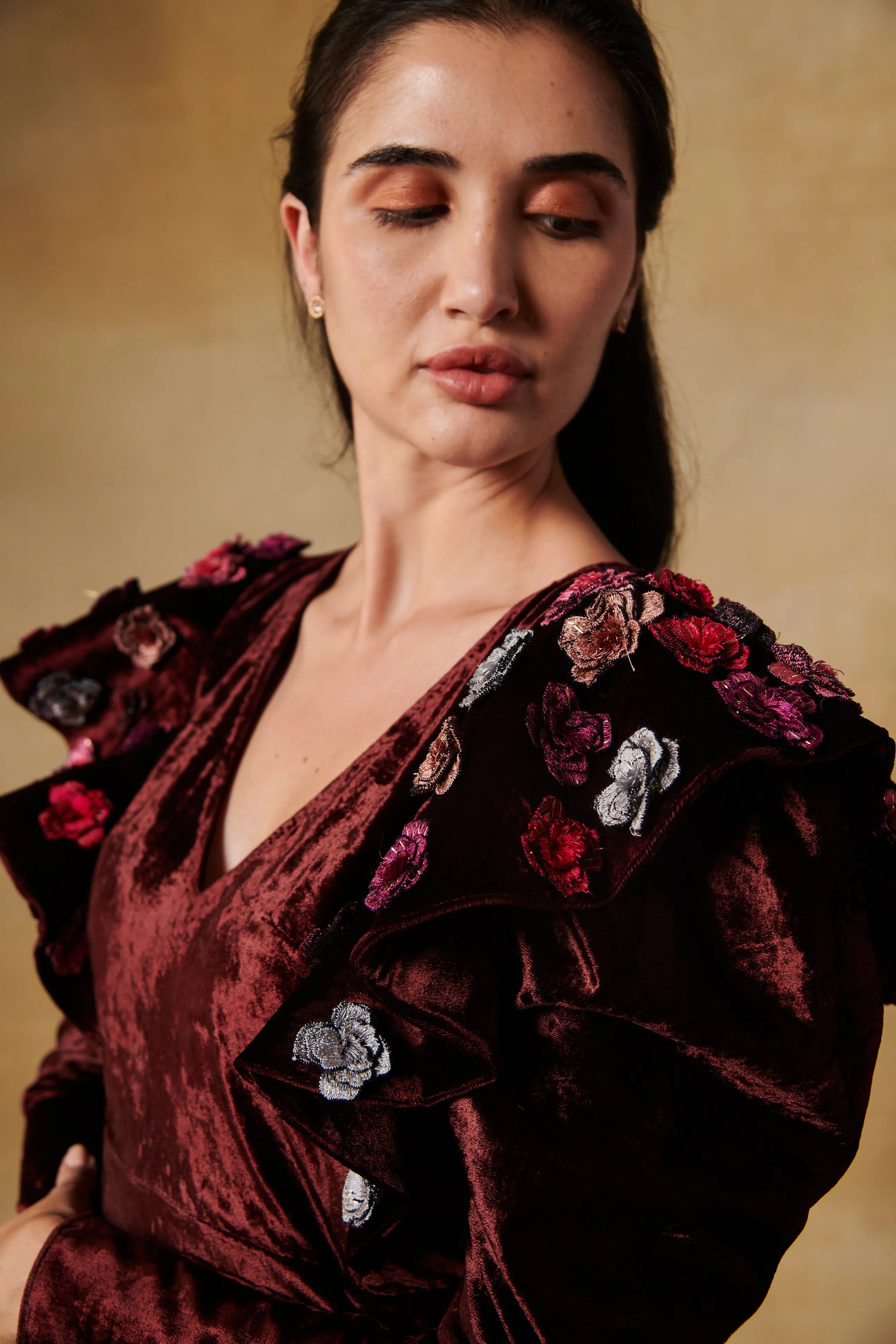 Deep maroon velvet cocktail dress with 3D flowers